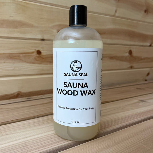 Sauna Seal Wood Wax 32oz in clear bottle with white label and black cap with wood background