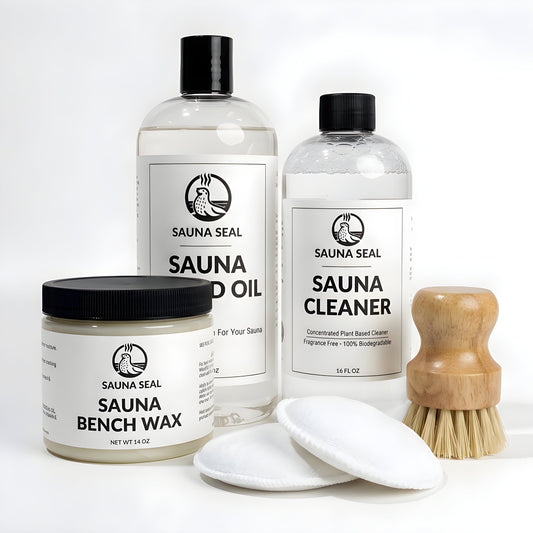 Sauna Seal Large Complete Sauna Care Kit: Sauna Wood Oil 32oz, Sauna Cleaner 16oz, Sauna Bench Wax 14oz, two applicator pads and bench scrub brush on a white background