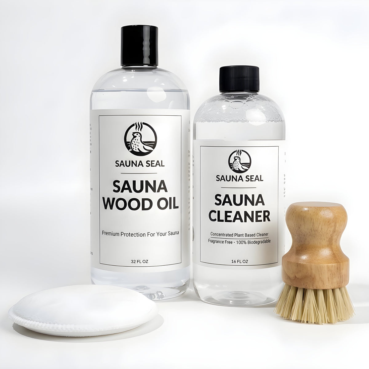 Sauna Seal Large Sauna Care Starter Kit: Sauna Wood Oil 32oz, Sauna Cleaner 16oz, applicator pad and bench scrub brush on a white background
